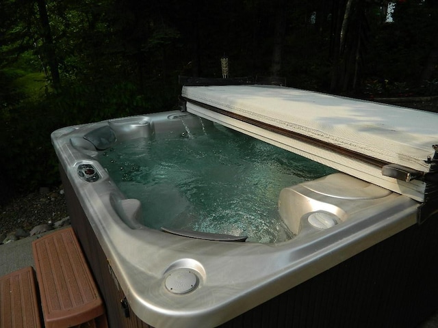 3749 Grizzly Ln, Barnum Twp, MN 55707 - view of swimming pool featuring a hot tub