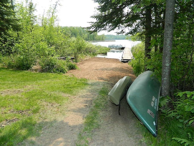 3749 Grizzly Ln, Barnum Twp, MN 55707 - view of yard with a water view and a dock