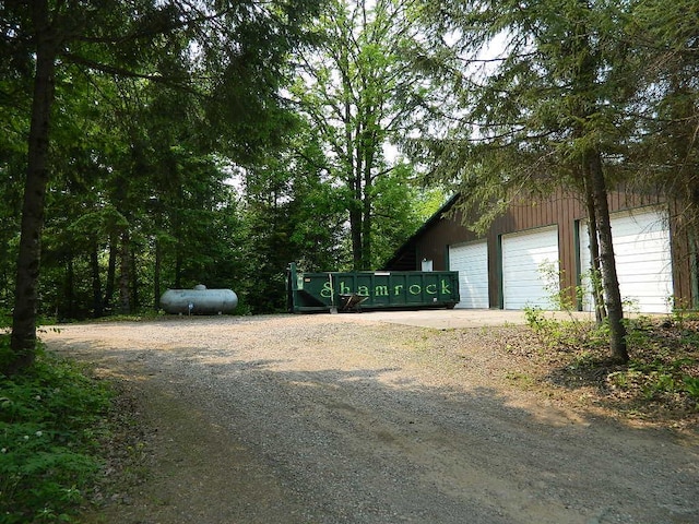 3749 Grizzly Ln, Barnum Twp, MN 55707 - garage with dirt driveway