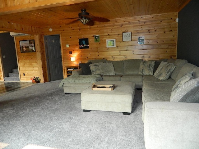 3749 Grizzly Ln, Barnum Twp, MN 55707 - carpeted living area featuring ceiling fan, stairs, wood ceiling, and wooden walls