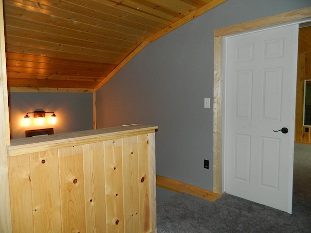 3749 Grizzly Ln, Barnum Twp, MN 55707 - hallway featuring vaulted ceiling, carpet flooring, and wooden ceiling