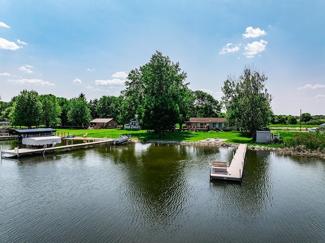3832 Norris Ave NW, French Lake Twp, MN 55302 - dock area with a water view and a lawn