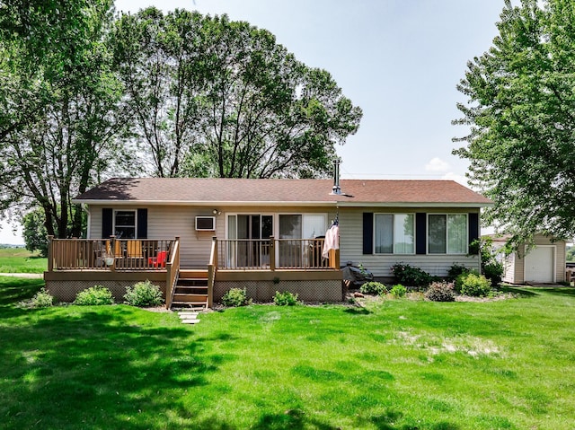 3832 Norris Ave NW, French Lake Twp, MN 55302 - back of property featuring a deck, a lawn, and a storage unit