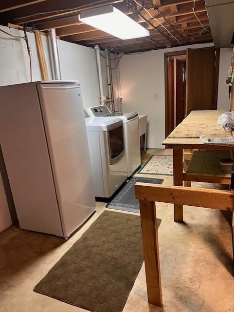 5951 Oakwood Mnr NE, Fridley, MN 55432 - washroom with washing machine and dryer