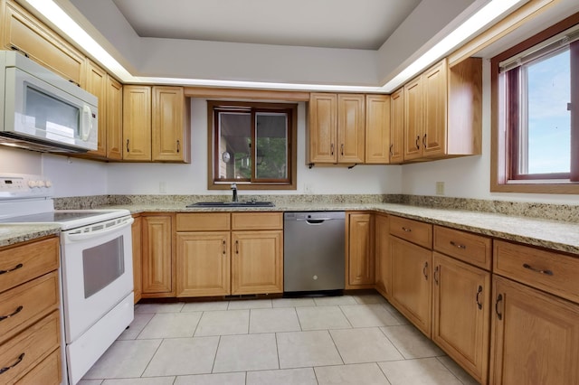 544 22nd St, Sioux Creek Twp, WI 54728 - kitchen featuring white appliances, a sink, light tile patterned floors, and light stone counters