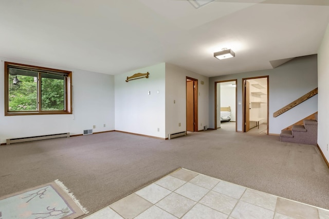 544 22nd St, Sioux Creek Twp, WI 54728 - empty room with a baseboard radiator, light colored carpet, stairs, and baseboards