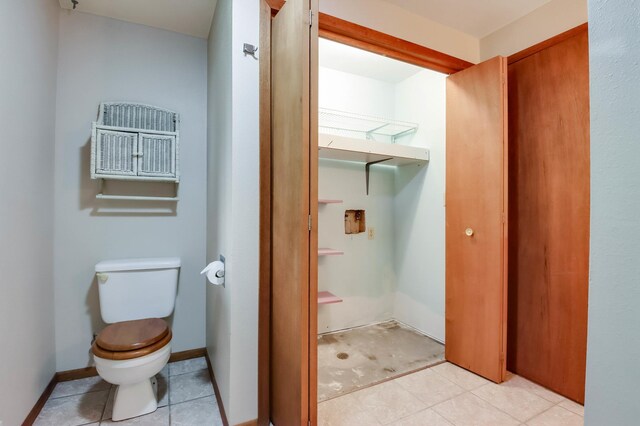 544 22nd St, Sioux Creek Twp, WI 54728 - bathroom featuring toilet and tile patterned floors