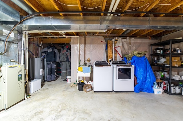 920 9th St, Rush City, MN 55069 - unfinished below grade area featuring washing machine and clothes dryer, electric water heater, and heating unit