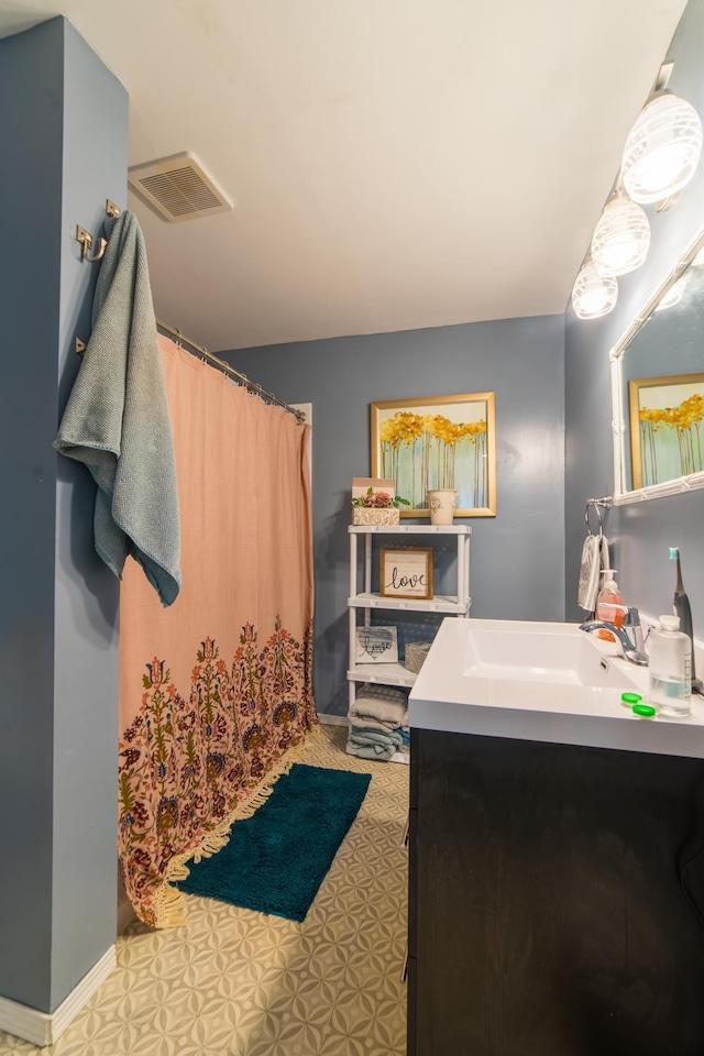 920 9th St, Rush City, MN 55069 - bathroom featuring vanity and a shower with curtain