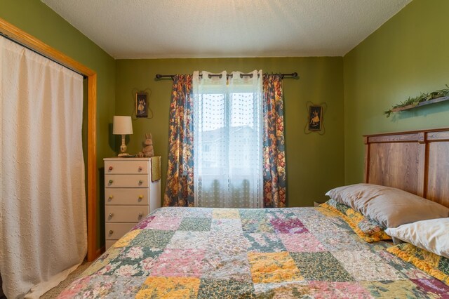 920 9th St, Rush City, MN 55069 - bedroom with a textured ceiling