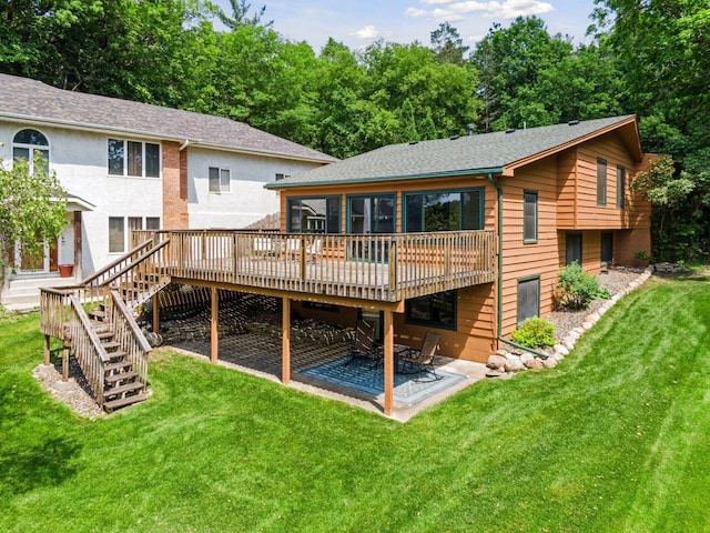 7469 Fernbrook Ln N, Maple Grove, MN 55311 - rear view of house with a deck, a patio area, a yard, and stairway