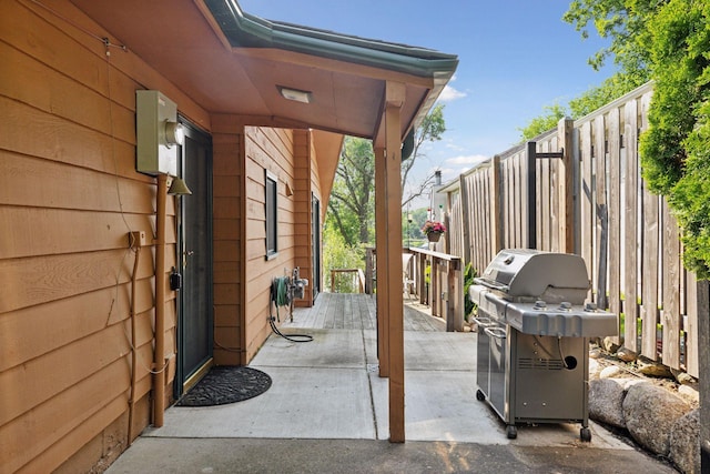7469 Fernbrook Ln N, Maple Grove, MN 55311 - view of patio featuring area for grilling