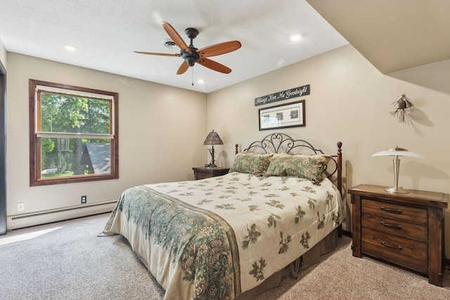 7469 Fernbrook Ln N, Maple Grove, MN 55311 - carpeted bedroom with a baseboard radiator, recessed lighting, and ceiling fan