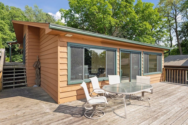7469 Fernbrook Ln N, Maple Grove, MN 55311 - wooden deck featuring outdoor dining area
