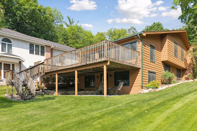 7469 Fernbrook Ln N, Maple Grove, MN 55311 - back of property featuring a deck, a lawn, stairs, and a patio area