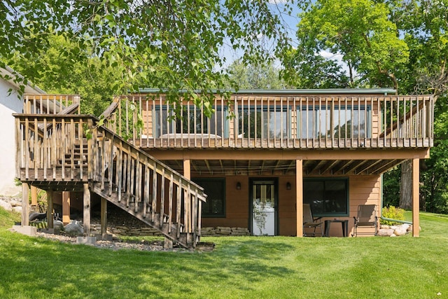 7469 Fernbrook Ln N, Maple Grove, MN 55311 - rear view of house featuring a deck, a lawn, and stairs