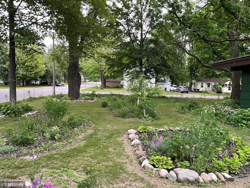211 Dion Ave, Mora, MN 55051 - view of grassy yard