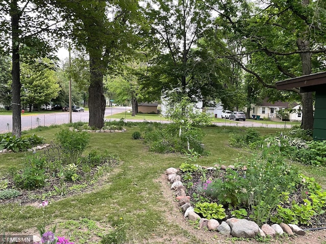 211 Dion Ave, Mora, MN 55051 - view of grassy yard