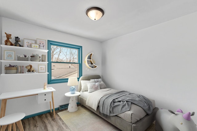 1813 Stinson Blvd, New Brighton, MN 55112 - bedroom with wood finished floors and baseboards