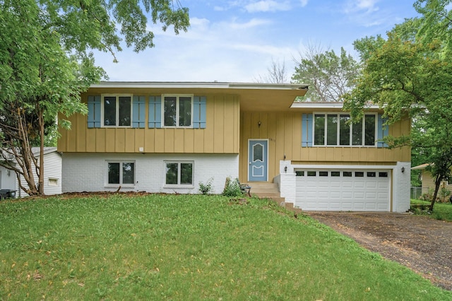 1813 Stinson Blvd, New Brighton, MN 55112 - bi-level home with driveway, brick siding, an attached garage, a front yard, and board and batten siding