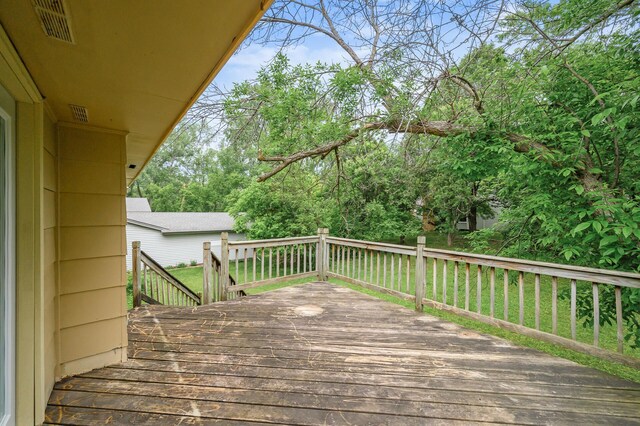 1813 Stinson Blvd, New Brighton, MN 55112 - wooden terrace featuring a yard