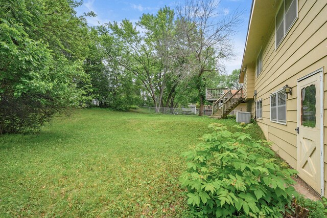 1813 Stinson Blvd, New Brighton, MN 55112 - view of yard with stairs and a wooden deck