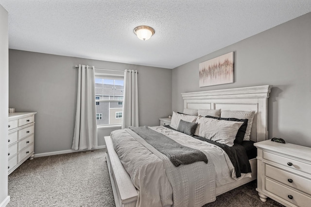 7363 146th Xing NW, Ramsey, MN 55303 - carpeted bedroom featuring a textured ceiling and baseboards