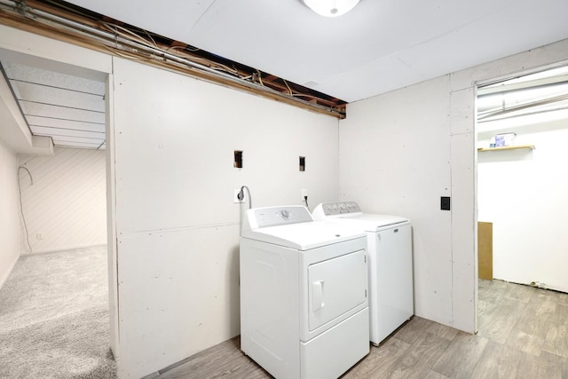 111 4th St, Kenyon, MN 55946 - laundry room featuring washer and dryer and light wood-style floors