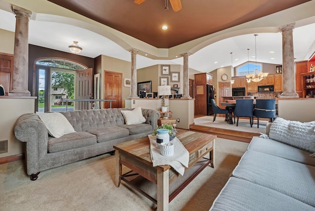 13023 Yellow Pine Cir NW, Coon Rapids, MN 55448 - living area with decorative columns, vaulted ceiling, light carpet, recessed lighting, and a chandelier