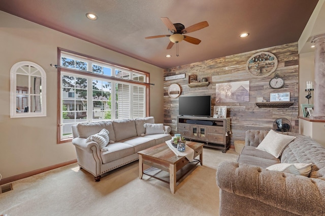 13023 Yellow Pine Cir NW, Coon Rapids, MN 55448 - living area featuring an accent wall, a ceiling fan, carpet floors, recessed lighting, and baseboards