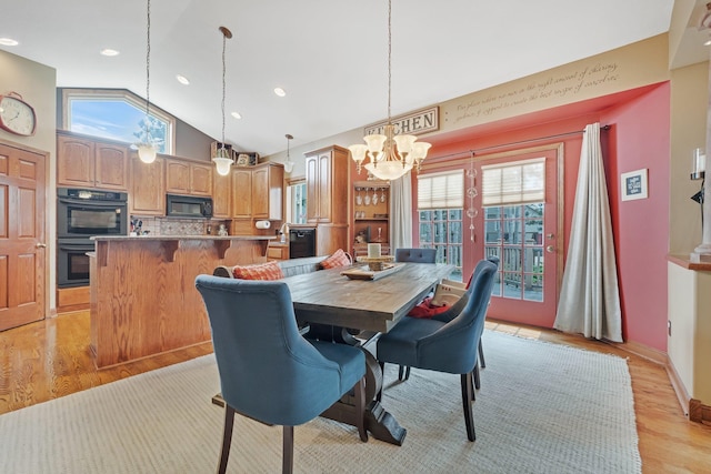 13023 Yellow Pine Cir NW, Coon Rapids, MN 55448 - dining room with a chandelier, light wood-style floors, recessed lighting, baseboards, and high vaulted ceiling