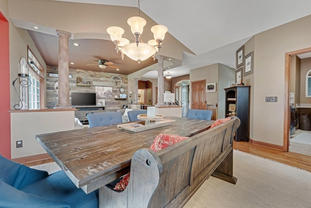 13023 Yellow Pine Cir NW, Coon Rapids, MN 55448 - dining area featuring decorative columns, ceiling fan, light wood-style floors, vaulted ceiling, and baseboards