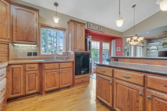 13023 Yellow Pine Cir NW, Coon Rapids, MN 55448 - kitchen featuring a sink, dishwasher, light wood-type flooring, lofted ceiling, and brown cabinetry