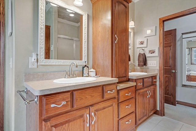 13023 Yellow Pine Cir NW, Coon Rapids, MN 55448 - full bath with double vanity, tile patterned floors, and a shower with door