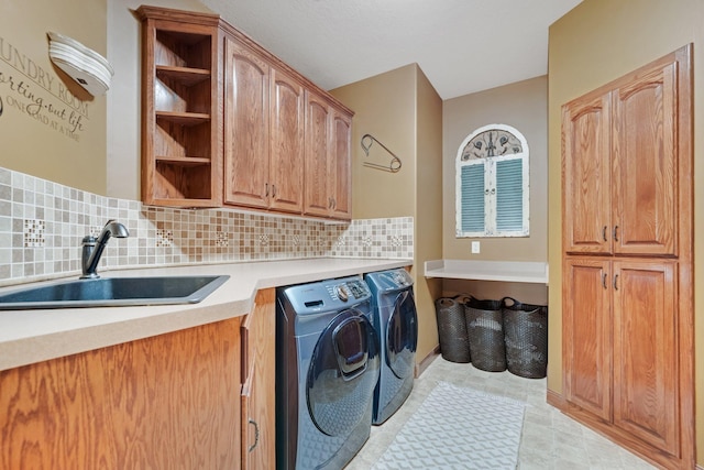 13023 Yellow Pine Cir NW, Coon Rapids, MN 55448 - laundry room with cabinet space and washer and dryer