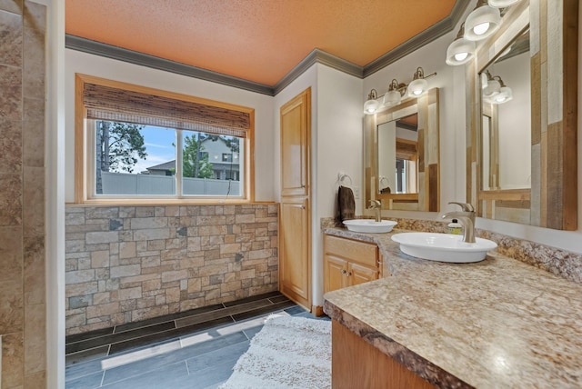 13023 Yellow Pine Cir NW, Coon Rapids, MN 55448 - bathroom with crown molding, double vanity, and a textured ceiling