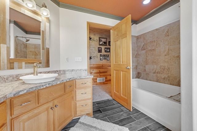 13023 Yellow Pine Cir NW, Coon Rapids, MN 55448 - bathroom with vanity, shower / tub combination, wood finish floors, and recessed lighting