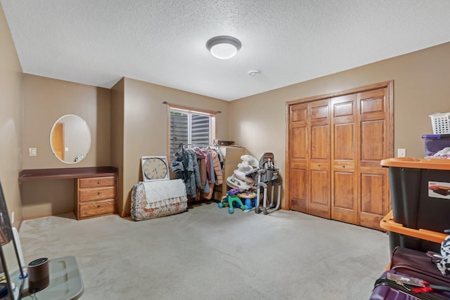 13023 Yellow Pine Cir NW, Coon Rapids, MN 55448 - bedroom featuring carpet floors and a textured ceiling