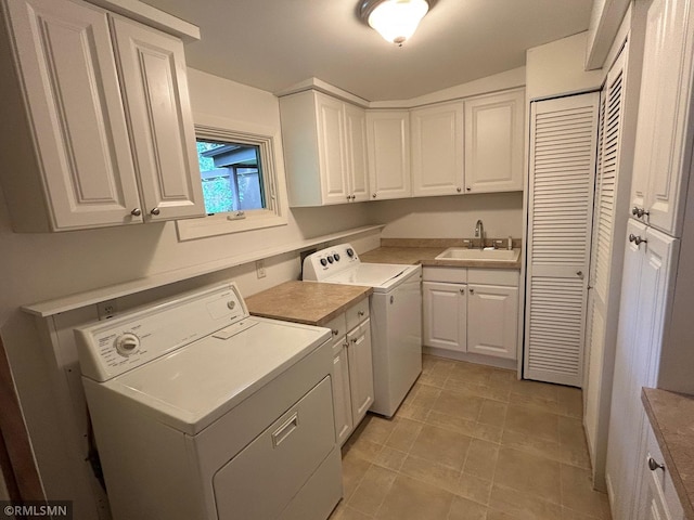 11209 Oak Ridge Ln W, Minnetonka, MN 55305 - laundry area with cabinet space and washing machine and clothes dryer