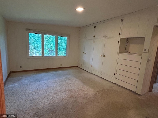 11209 Oak Ridge Ln W, Minnetonka, MN 55305 - unfurnished bedroom featuring light colored carpet and a closet