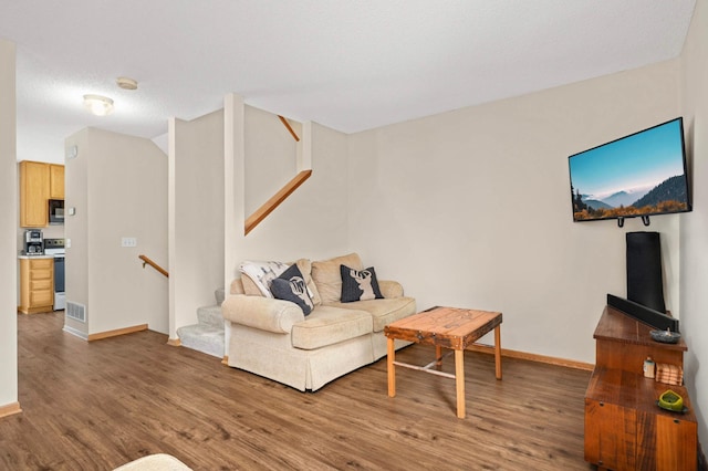 15524 Float Ln, Apple Valley, MN 55124 - living area with wood finished floors and stairs