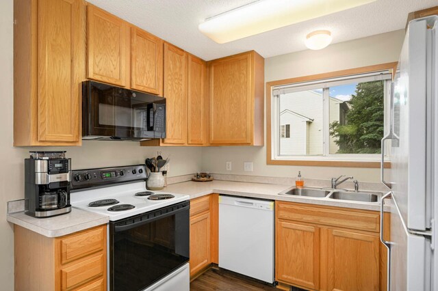 15524 Float Ln, Apple Valley, MN 55124 - kitchen featuring white appliances, light countertops, and dark wood-style flooring