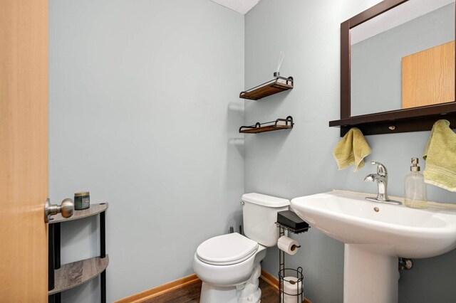 15524 Float Ln, Apple Valley, MN 55124 - bathroom featuring toilet and wood finished floors