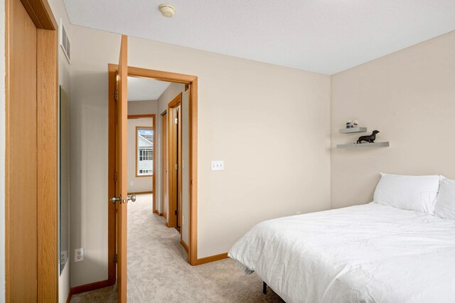 15524 Float Ln, Apple Valley, MN 55124 - bedroom with light colored carpet and baseboards
