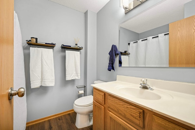 15524 Float Ln, Apple Valley, MN 55124 - bathroom with wood finished floors, vanity, and a textured ceiling