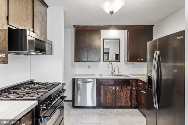 6316 15th Ave S, Richfield, MN 55423 - kitchen with fridge with ice dispenser, gas stove, a sink, and light countertops