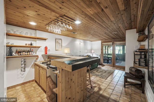 6316 15th Ave S, Richfield, MN 55423 - kitchen featuring wooden ceiling, dishwashing machine, a peninsula, light tile patterned floors, and french doors
