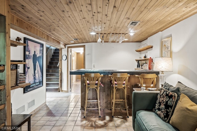 6316 15th Ave S, Richfield, MN 55423 - indoor bar featuring stairway, light tile patterned flooring, and wooden ceiling