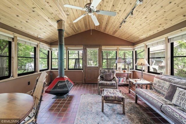 6316 15th Ave S, Richfield, MN 55423 - sunroom with a wood stove, tile patterned floors, rail lighting, vaulted ceiling, and wood ceiling