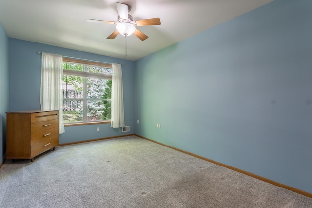2230 Lower Afton Rd E, Saint Paul, MN 55119 - unfurnished room with a ceiling fan, light carpet, and baseboards